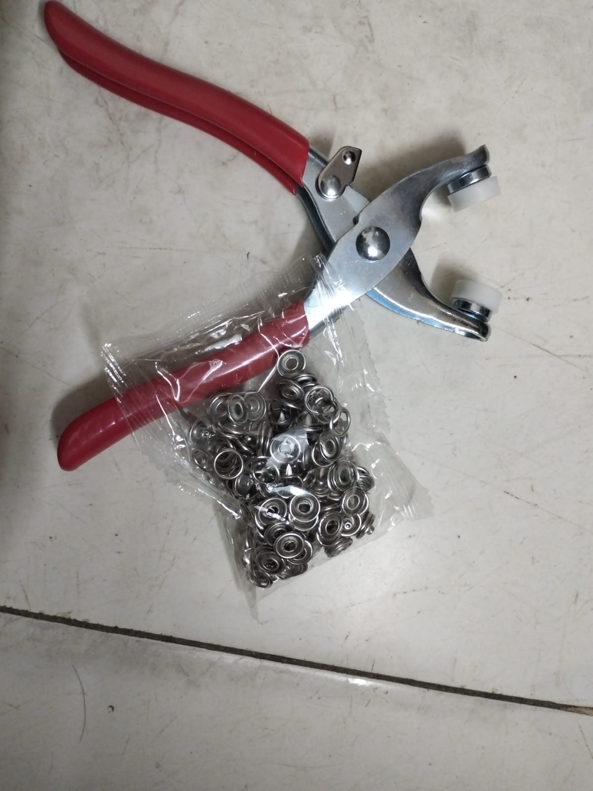 Tich Button piler with 50 buttons